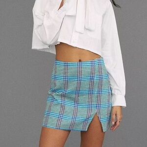 Urban Outfitters Darren Notched Plaid Linen
Blend Mini Skirt